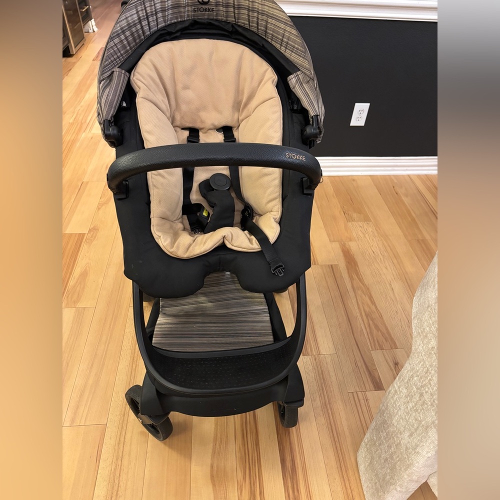 Stokke Black and Cream Kids Stroller